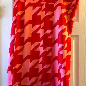 Plus size Pink and Red Houndstooth skirt from Eloquii